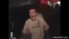 Excited guy waving hands in club