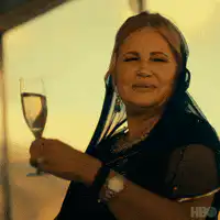 Woman laughing with champagne