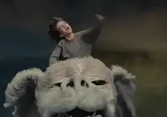 E.T. riding the alien creature