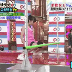 Woman does backbend under bar