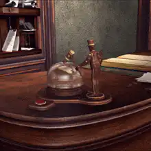 Desk bell and gavel figurine
