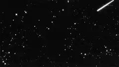 shooting star in night sky
