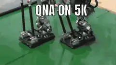 Two robots walking on green floor