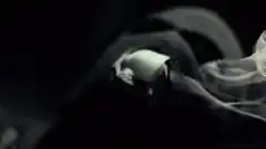 smoke forming a hand