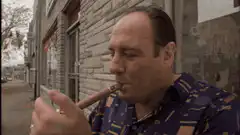 James Gandolfini smoking a cigar
