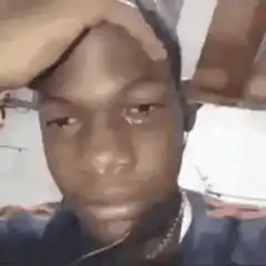 Crying man holding his head