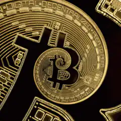 Gold Bitcoin coin close-up