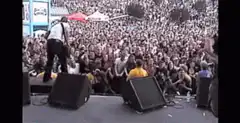 Musician crowd surfs at concert