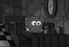 SpongeBob sitting alone in a diner
