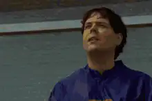 Man in blue jumps off balcony