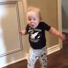 Toddler dancing excitedly
