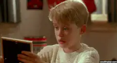 Macaulay Culkin looks at Joe Biden