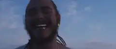 Post Malone laughing and pointing