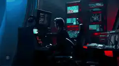 Woman working in a futuristic control room