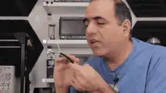 Man blows on wire and gets shocked