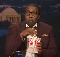 Kenan Thompson eating popcorn