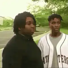 Two guys talking and one turns around