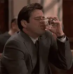 Jim Carrey spits out water