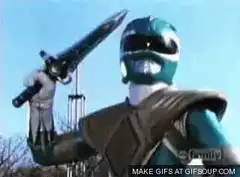 Green Ranger blows sword like a flute