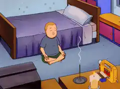 Buddha Carl meditating in his bedroom