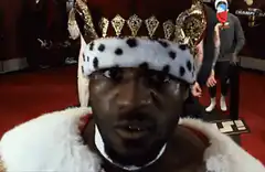 Tyson Fury wearing a crown and fur robe