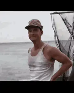 Forrest Gump waving on a boat