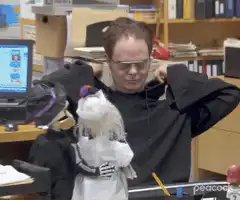 Dwight Schrute puts on a hood