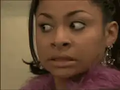 Woman's eyes widen in shock