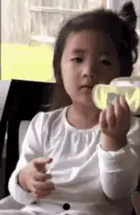 Little girl flips off the camera