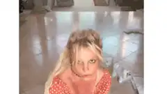 Woman in polka dot top with knife