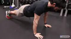 Man doing push-ups in gym