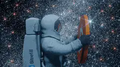 Astronaut holding a Bitcoin coin