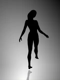 silhouette of a woman walking