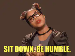 Woman sitting down and being humble