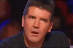 Simon Cowell surprised face