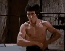 Bruce Lee doing the dragon dance
