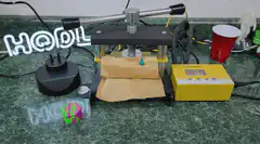 Small object crushed by hydraulic press