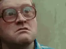 Man with glasses eyes bulge
