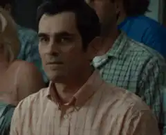 Ty Burrell smirking in audience