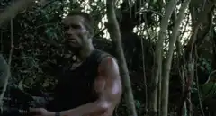 Arnold Schwarzenegger flexes in the jungle