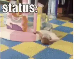 Toddler lying on floor while carousel spins