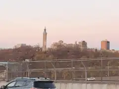 City skyline at dusk with clock tower