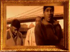 Three men in a gold frame