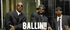 Three men in suits dancing with BALLIN!! text