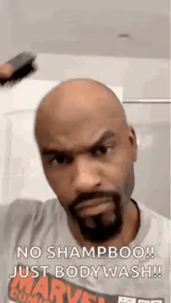 Man combing bald head no shampoo