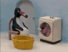 Pingu smoking by the washing machine