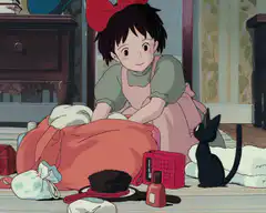 Kiki and Jiji packing a bag