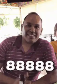 Man smiling with 88888 text