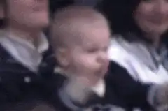 Baby clapping and screaming