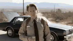 Sheriff Buford Pusser drinks water